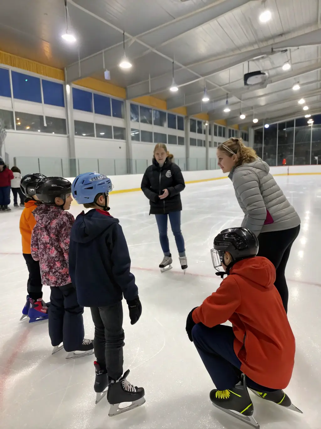 A group of skaters participating in a public skating session at PalaFeltre, enjoying a fun and recreational activity on the ice.